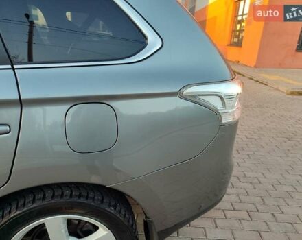 Серый Мицубиси Аутлендер, объемом двигателя 2.3 л и пробегом 250 тыс. км за 13999 $, фото 99 на Automoto.ua