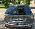 Сірий Міцубісі Аутлендер, об'ємом двигуна 2.4 л та пробігом 200 тис. км за 271 $, фото 1 на Automoto.ua