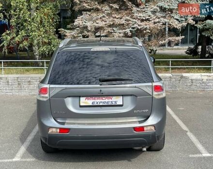 Серый Мицубиси Аутлендер, объемом двигателя 2.4 л и пробегом 157 тыс. км за 12700 $, фото 6 на Automoto.ua