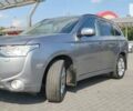Сірий Міцубісі Аутлендер, об'ємом двигуна 2 л та пробігом 328 тис. км за 11400 $, фото 1 на Automoto.ua