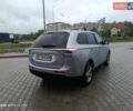 Сірий Міцубісі Аутлендер, об'ємом двигуна 2.4 л та пробігом 228 тис. км за 11900 $, фото 1 на Automoto.ua