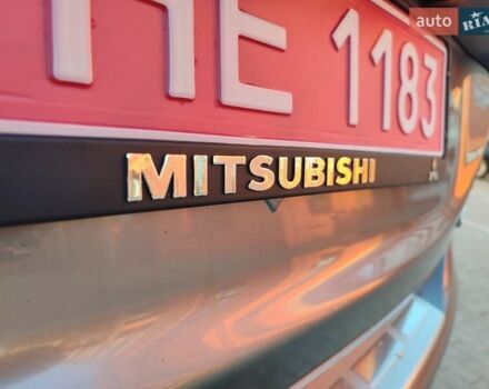 Серый Мицубиси Аутлендер, объемом двигателя 2.3 л и пробегом 250 тыс. км за 13499 $, фото 106 на Automoto.ua