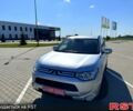 Серый Мицубиси Аутлендер, объемом двигателя 2.2 л и пробегом 200 тыс. км за 14500 $, фото 1 на Automoto.ua