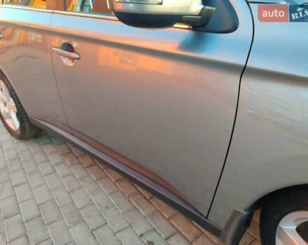 Серый Мицубиси Аутлендер, объемом двигателя 2.3 л и пробегом 250 тыс. км за 12999 $, фото 104 на Automoto.ua