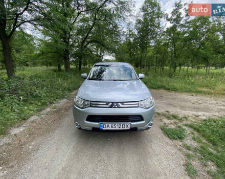 Серый Мицубиси Аутлендер, объемом двигателя 2 л и пробегом 203 тыс. км за 10999 $, фото 1 на Automoto.ua