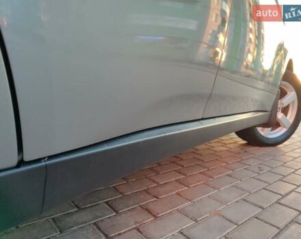 Серый Мицубиси Аутлендер, объемом двигателя 2.3 л и пробегом 250 тыс. км за 13999 $, фото 2 на Automoto.ua