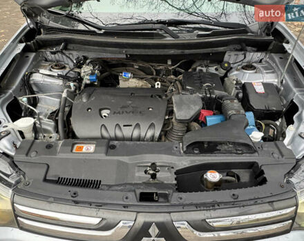 Сірий Міцубісі Аутлендер, об'ємом двигуна 2.36 л та пробігом 177 тис. км за 13499 $, фото 20 на Automoto.ua