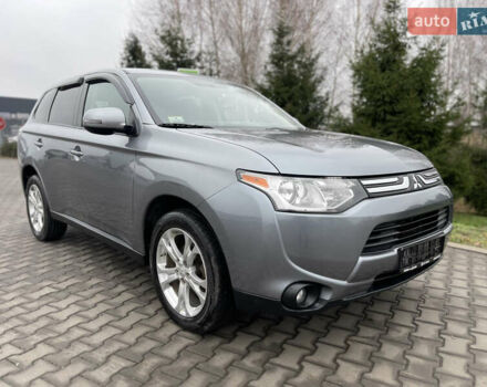 Сірий Міцубісі Аутлендер, об'ємом двигуна 2.4 л та пробігом 240 тис. км за 9999 $, фото 2 на Automoto.ua