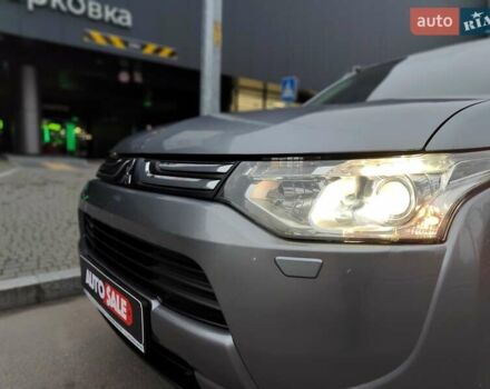 Серый Мицубиси Аутлендер, объемом двигателя 2.4 л и пробегом 209 тыс. км за 10990 $, фото 1 на Automoto.ua