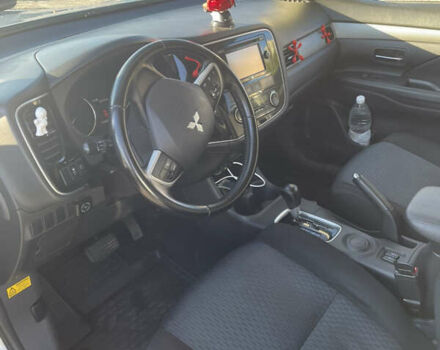 Серый Мицубиси Аутлендер, объемом двигателя 2.36 л и пробегом 177 тыс. км за 11990 $, фото 8 на Automoto.ua