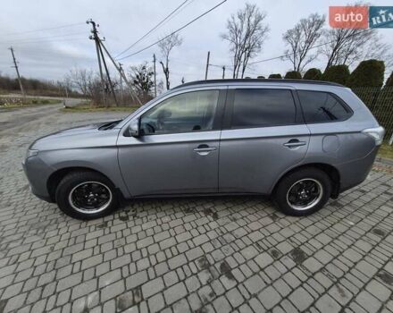 Сірий Міцубісі Аутлендер, об'ємом двигуна 2.4 л та пробігом 228 тис. км за 13500 $, фото 10 на Automoto.ua