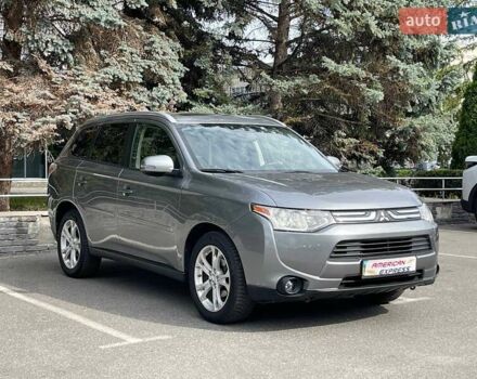 Серый Мицубиси Аутлендер, объемом двигателя 2.4 л и пробегом 157 тыс. км за 12700 $, фото 1 на Automoto.ua