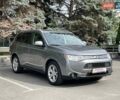 Серый Мицубиси Аутлендер, объемом двигателя 2.4 л и пробегом 157 тыс. км за 12700 $, фото 1 на Automoto.ua