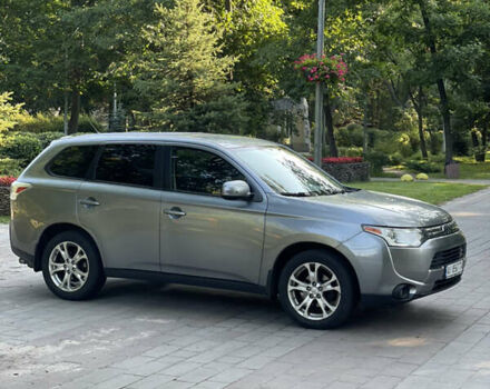 Серый Мицубиси Аутлендер, объемом двигателя 2.4 л и пробегом 150 тыс. км за 10750 $, фото 1 на Automoto.ua