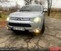Серый Мицубиси Аутлендер, объемом двигателя 2.4 л и пробегом 139 тыс. км за 11650 $, фото 1 на Automoto.ua