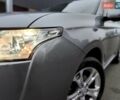Серый Мицубиси Аутлендер, объемом двигателя 2.4 л и пробегом 209 тыс. км за 10990 $, фото 2 на Automoto.ua