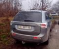 Сірий Міцубісі Аутлендер, об'ємом двигуна 2.4 л та пробігом 224 тис. км за 11500 $, фото 1 на Automoto.ua