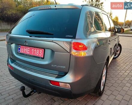 Серый Мицубиси Аутлендер, объемом двигателя 2.3 л и пробегом 250 тыс. км за 12999 $, фото 2 на Automoto.ua