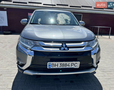 Серый Мицубиси Аутлендер, объемом двигателя 2.5 л и пробегом 205 тыс. км за 12400 $, фото 2 на Automoto.ua