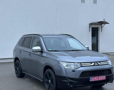 Серый Мицубиси Аутлендер, объемом двигателя 2.2 л и пробегом 206 тыс. км за 13700 $, фото 2 на Automoto.ua