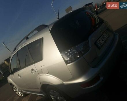 Серый Мицубиси Аутлендер, объемом двигателя 2.4 л и пробегом 133 тыс. км за 12000 $, фото 1 на Automoto.ua