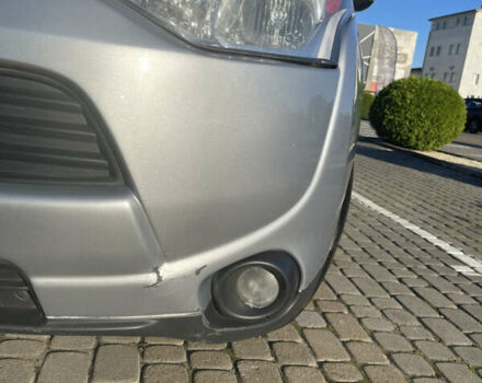 Серый Мицубиси Аутлендер, объемом двигателя 2.36 л и пробегом 177 тыс. км за 11990 $, фото 3 на Automoto.ua