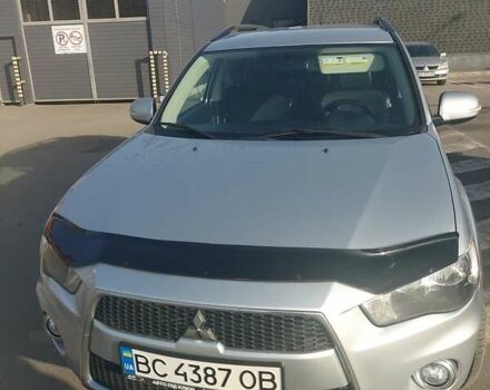 Серый Мицубиси Аутлендер, объемом двигателя 2.4 л и пробегом 133 тыс. км за 12000 $, фото 3 на Automoto.ua