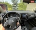 Серый Мицубиси Аутлендер, объемом двигателя 2.36 л и пробегом 171 тыс. км за 10000 $, фото 8 на Automoto.ua