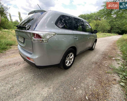 Серый Мицубиси Аутлендер, объемом двигателя 2 л и пробегом 203 тыс. км за 10999 $, фото 6 на Automoto.ua