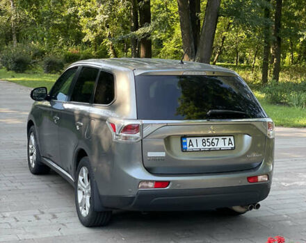 Серый Мицубиси Аутлендер, объемом двигателя 2.4 л и пробегом 150 тыс. км за 10750 $, фото 6 на Automoto.ua