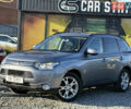 Серый Мицубиси Аутлендер, объемом двигателя 2.3 л и пробегом 193 тыс. км за 14500 $, фото 1 на Automoto.ua