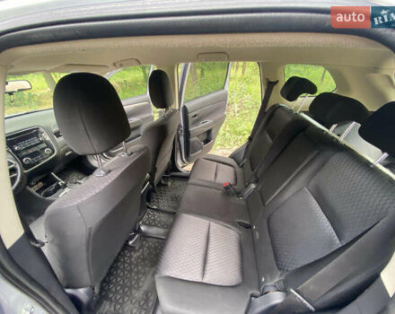 Серый Мицубиси Аутлендер, объемом двигателя 2 л и пробегом 203 тыс. км за 10999 $, фото 14 на Automoto.ua