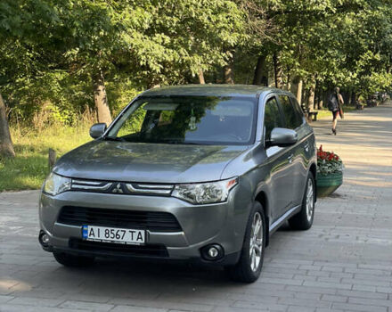 Серый Мицубиси Аутлендер, объемом двигателя 2.4 л и пробегом 150 тыс. км за 10750 $, фото 3 на Automoto.ua