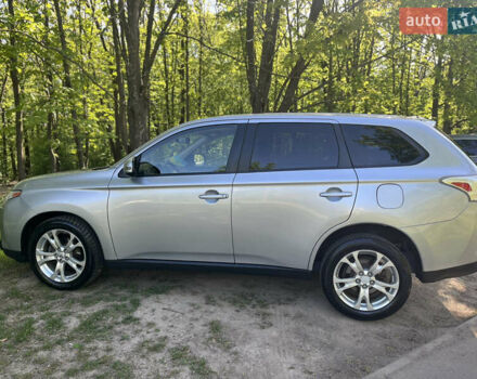 Сірий Міцубісі Аутлендер, об'ємом двигуна 2.36 л та пробігом 162 тис. км за 10500 $, фото 1 на Automoto.ua