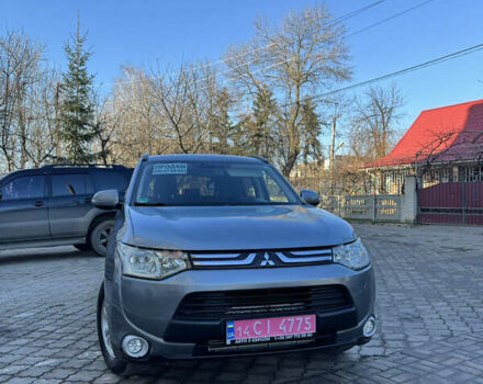 Серый Мицубиси Аутлендер, объемом двигателя 2.2 л и пробегом 200 тыс. км за 13200 $, фото 1 на Automoto.ua