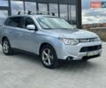 Серый Мицубиси Аутлендер, объемом двигателя 2.4 л и пробегом 228 тыс. км за 13999 $, фото 1 на Automoto.ua