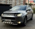 Серый Мицубиси Аутлендер, объемом двигателя 2.36 л и пробегом 213 тыс. км за 12700 $, фото 1 на Automoto.ua