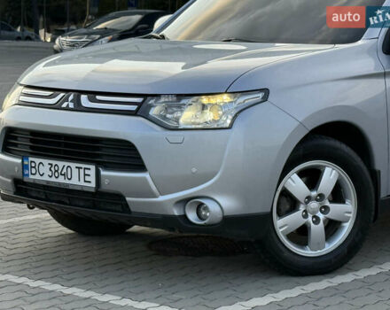 Серый Мицубиси Аутлендер, объемом двигателя 2.4 л и пробегом 156 тыс. км за 14400 $, фото 2 на Automoto.ua
