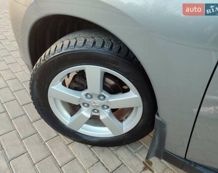 Серый Мицубиси Аутлендер, объемом двигателя 2.3 л и пробегом 250 тыс. км за 13499 $, фото 95 на Automoto.ua