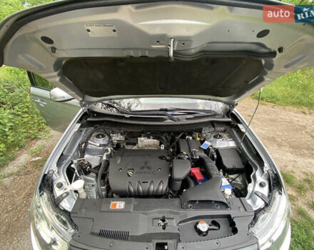 Серый Мицубиси Аутлендер, объемом двигателя 2 л и пробегом 203 тыс. км за 10999 $, фото 22 на Automoto.ua