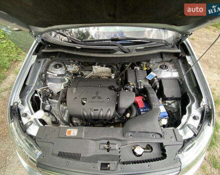 Серый Мицубиси Аутлендер, объемом двигателя 2 л и пробегом 203 тыс. км за 10999 $, фото 19 на Automoto.ua