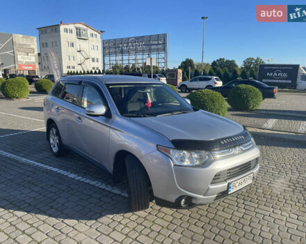 Серый Мицубиси Аутлендер, объемом двигателя 2.36 л и пробегом 177 тыс. км за 11990 $, фото 1 на Automoto.ua