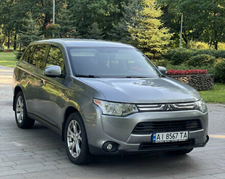 Серый Мицубиси Аутлендер, объемом двигателя 2.4 л и пробегом 150 тыс. км за 10750 $, фото 2 на Automoto.ua