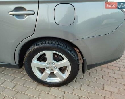 Серый Мицубиси Аутлендер, объемом двигателя 2.3 л и пробегом 250 тыс. км за 13999 $, фото 21 на Automoto.ua