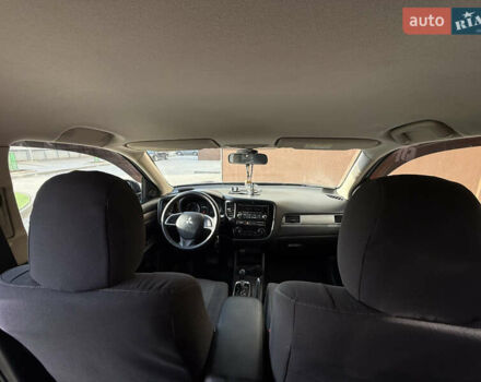 Серый Мицубиси Аутлендер, объемом двигателя 2 л и пробегом 137 тыс. км за 13700 $, фото 12 на Automoto.ua