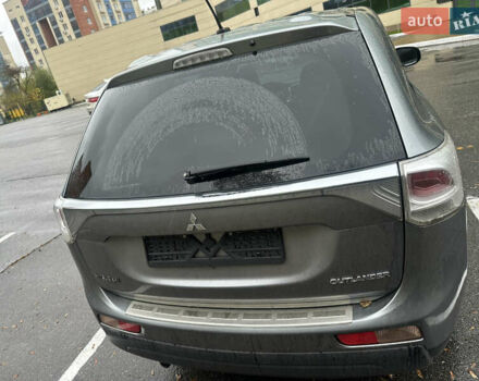 Сірий Міцубісі Аутлендер, об'ємом двигуна 2.4 л та пробігом 219 тис. км за 10800 $, фото 3 на Automoto.ua