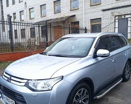 Серый Мицубиси Аутлендер, объемом двигателя 2.4 л и пробегом 197 тыс. км за 14000 $, фото 2 на Automoto.ua