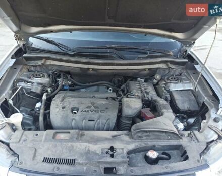 Серый Мицубиси Аутлендер, объемом двигателя 2.4 л и пробегом 197 тыс. км за 14000 $, фото 27 на Automoto.ua