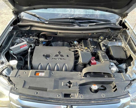 Сірий Міцубісі Аутлендер, об'ємом двигуна 2.4 л та пробігом 209 тис. км за 12200 $, фото 20 на Automoto.ua