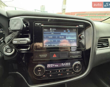 Серый Мицубиси Аутлендер, объемом двигателя 2.36 л и пробегом 198 тыс. км за 13990 $, фото 20 на Automoto.ua